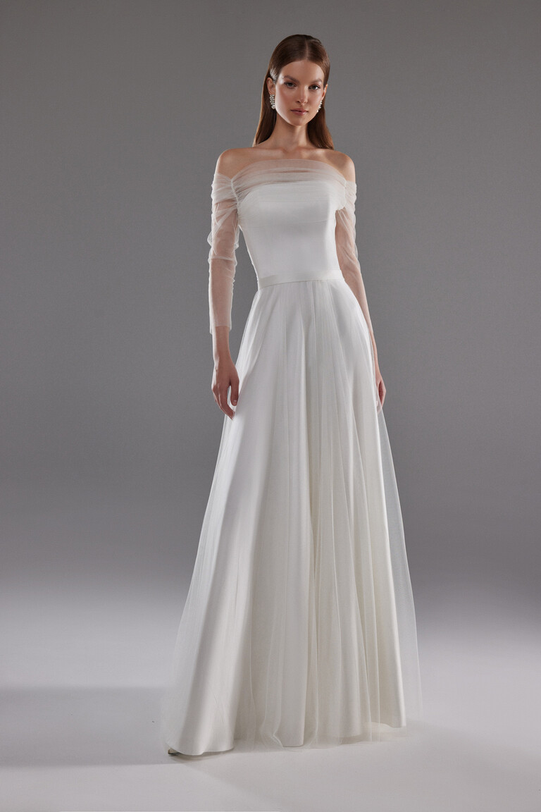 Full length front view of Millie off-shoulder satin wedding dress with sheer mesh sleeves