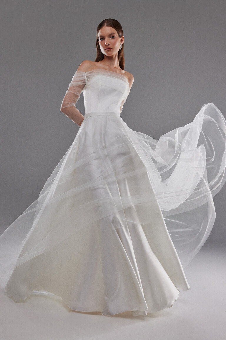 Millie A-line bridal gown front view showing lightweight airy mesh skirt movement