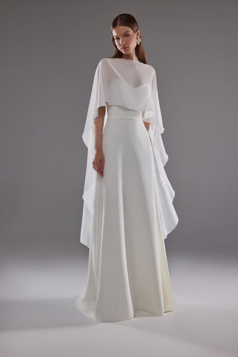 Full length view of Cape Emm off-white sheer chiffon overlay for bridal dresses