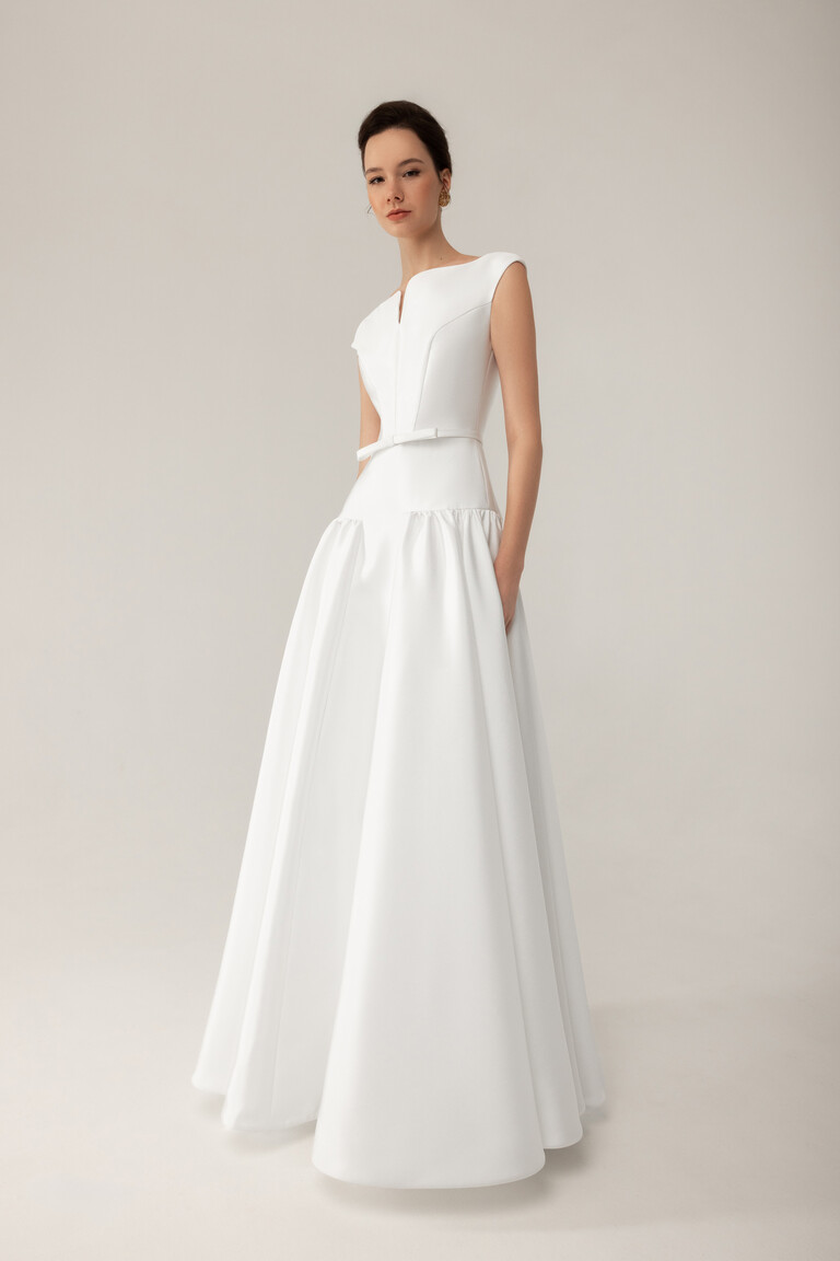 Modern Structured A-Line Silhouette Lika Full length Lika A-line wedding gown showing structured bodice and dropped waist design