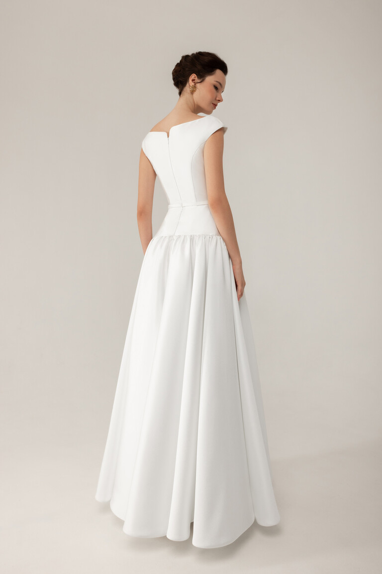 Voluminous Pleated Mikado Skirt Back View Lika off-white floor length wedding gown back view with voluminous pleated mikado skirt
