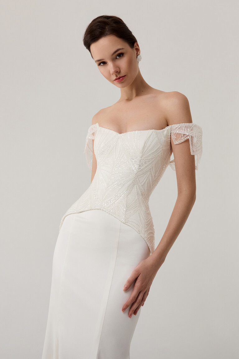 Sweetheart Neckline & Sequin Details Medium shot of Diva dress bodice with sweetheart neckline and geometric white sequin embellishment