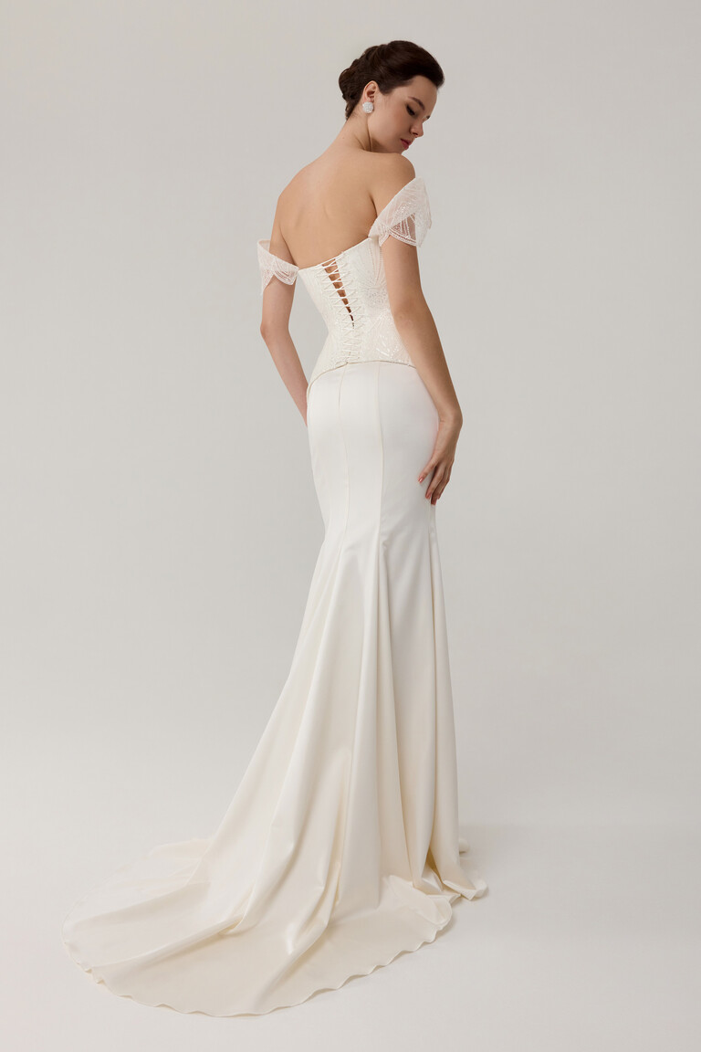 Long Satin Train & Corset Back Full length back view of Diva mermaid wedding dress showing long satin train and corset lacing