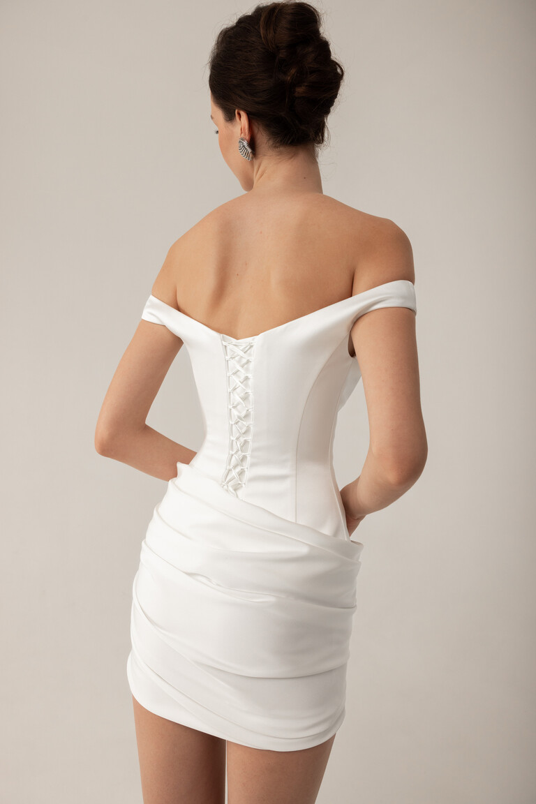 Structured Corset Back Design for Perfect Fit Lori off-white reception dress back detail showing structured corset bodice and draped hips