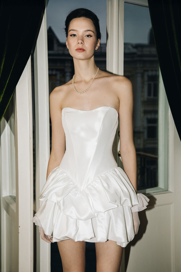 Close up of Malika off-white taffeta dress bodice with sweetheart neckline and fitted waist