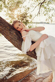 Sia Tiered Chiffon Boho Wedding Dress preview photo # 12