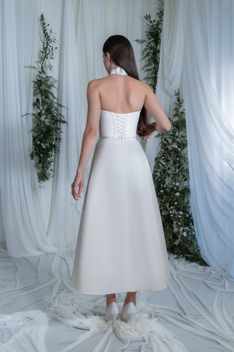 Back view of Verona midi wedding dress showing functional lace-up closure and open back design