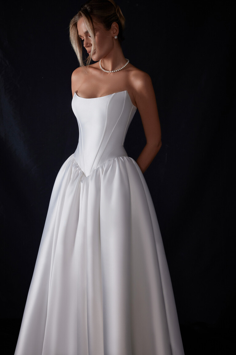 Faith strapless corset wedding dress bodice detail on black background