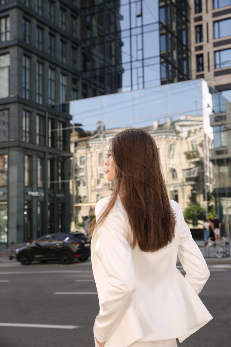 Back view of Elif satin bridal jacket showing structured fit and clean lines