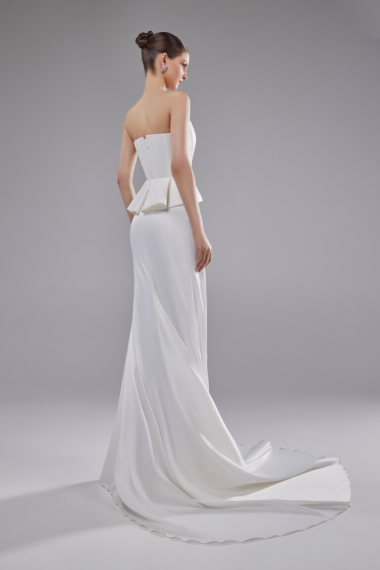 Back view Hazel two-piece wedding dress with long satin train and peplum