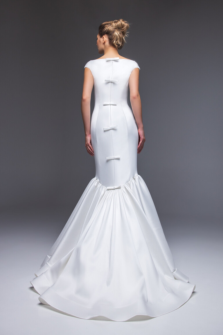 Rear view Rachel gown with vertical bows and flared mermaid skirt off-white