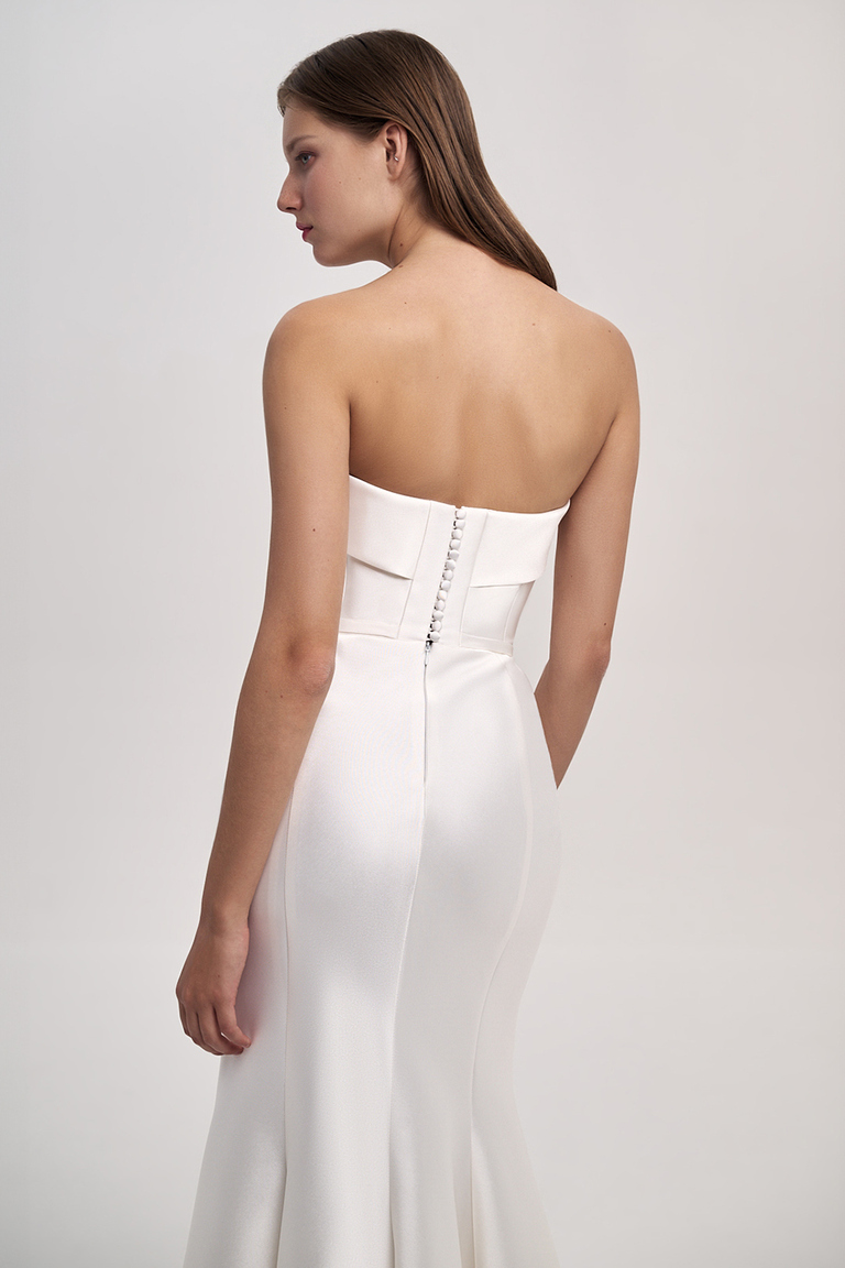 Close up of back bodice on Gala Mikado dress showing fabric covered buttons and structured fit