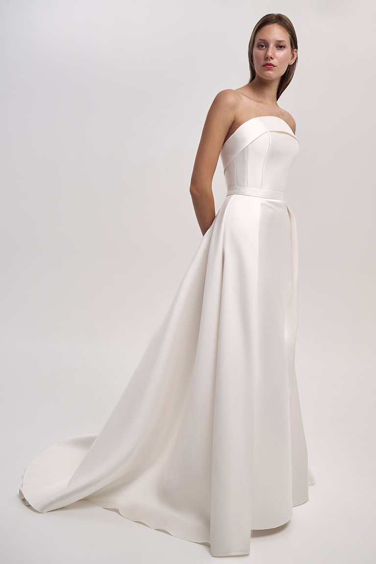 Front side view of Gala off-white Mikado overskirt adding A-line volume to wedding dress