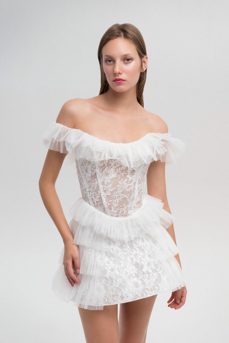 Front detail of Luna off-white dress with floral lace and pleated tulle ruffles
