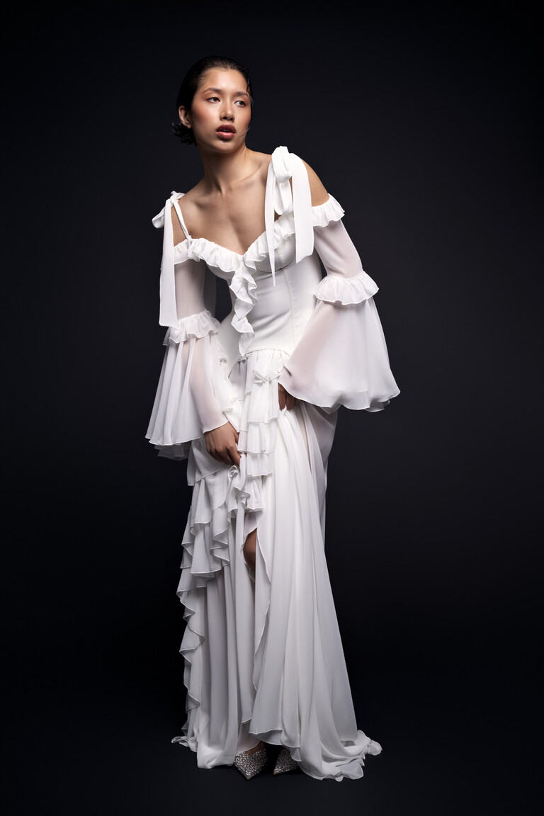 Riot A-line wedding dress with sweetheart neckline shoulder bows and high thigh slit