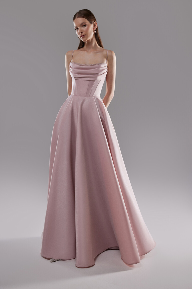 Rihanna powder satin dress featuring beaded cowl neckline and structured corset bodice details