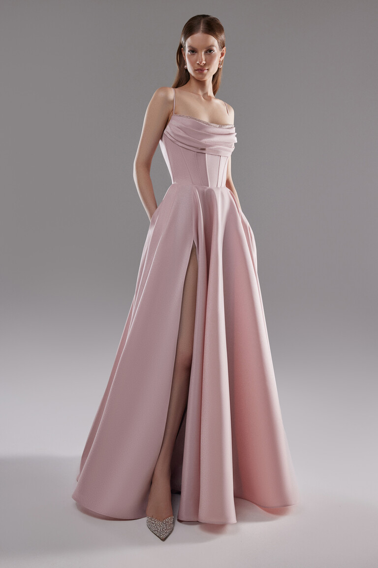 Rihanna powder pink satin evening dress featuring high thigh slit and flowing A-line skirt