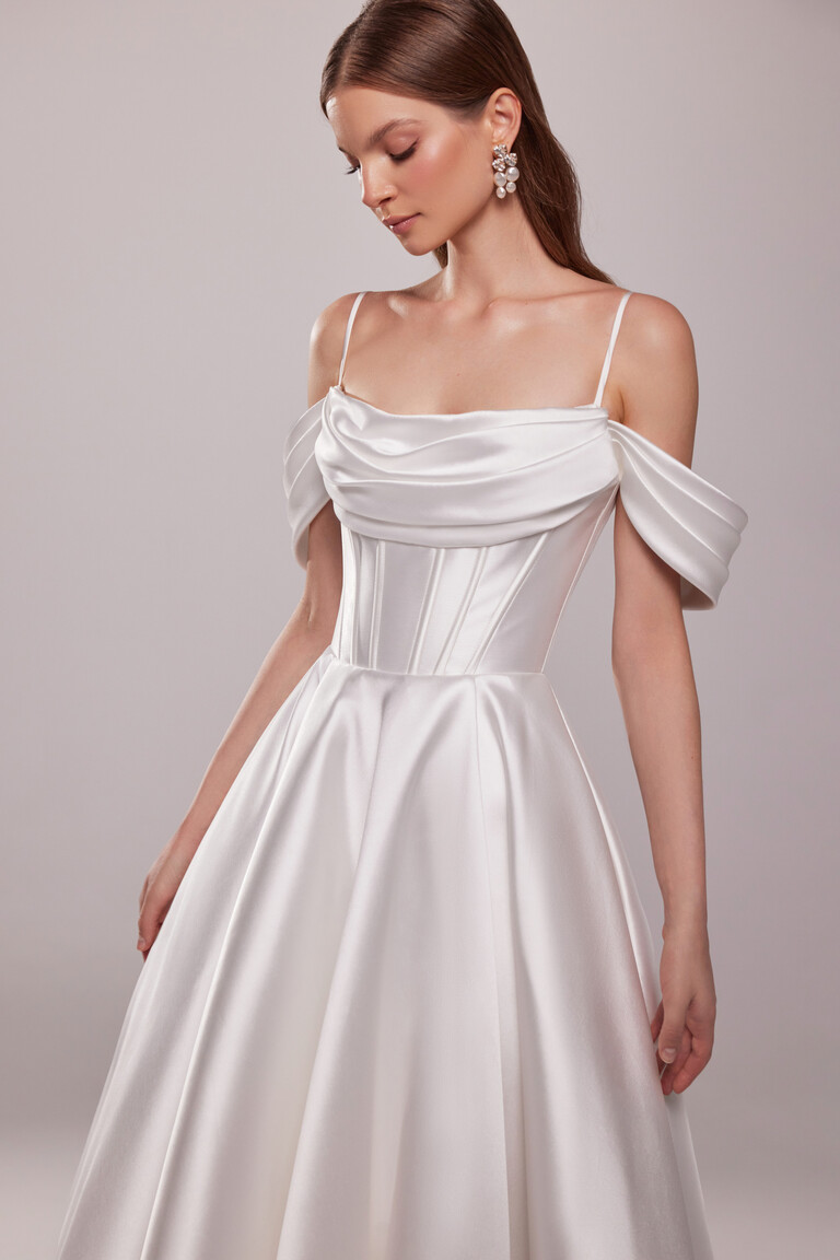 Sunny wedding dress bodice detail showing cowl neckline and structured corset with exposed boning