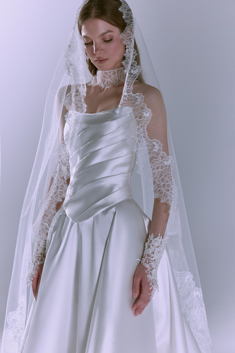 Front view of Tori lace edge wedding veil ivory showing intricate floral patterns