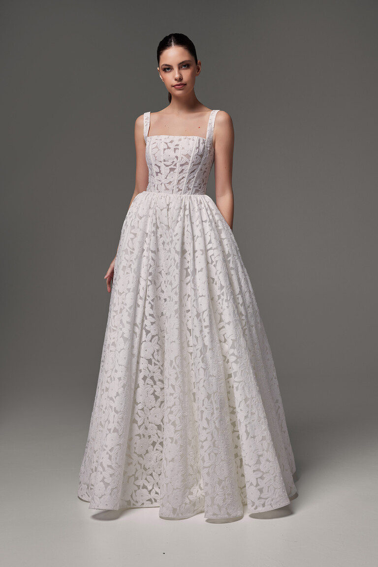 Unona Ruta off-white A-line wedding dress with floral lace pattern front view