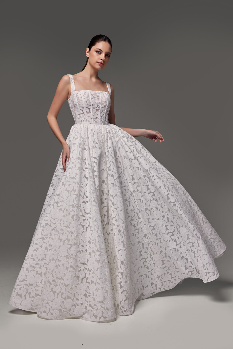 Ruta square neck bridal gown with structured boning and voluminous lace skirt