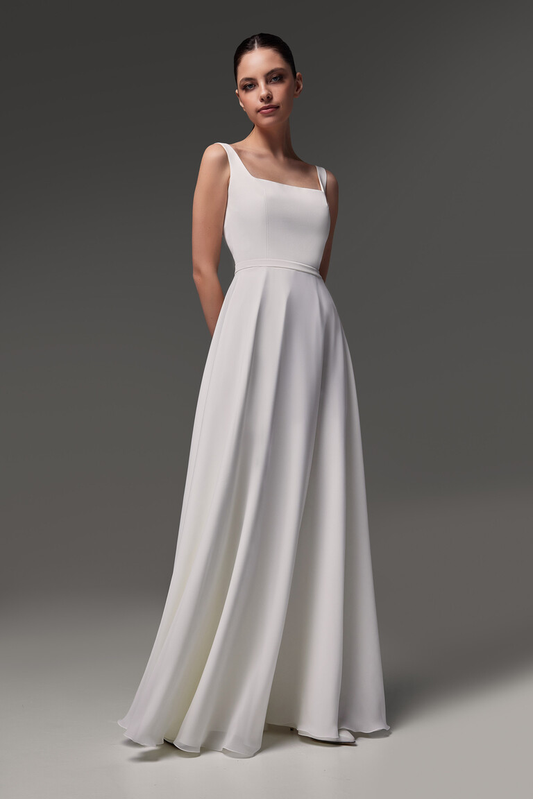 Evita ivory chiffon wedding dress front view showing soft skirt folds and square neck