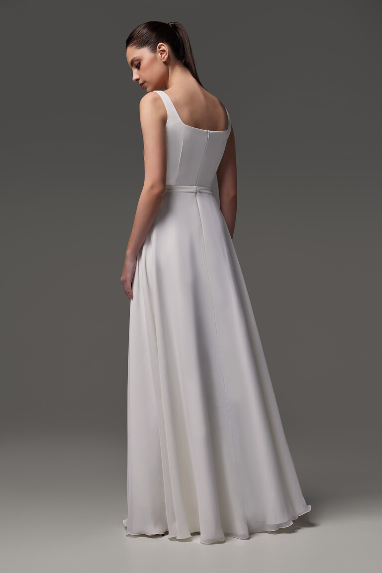 Full length back view of Evita dress showing concealed zipper and smooth A-line skirt