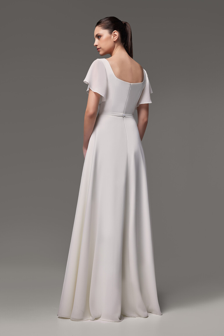 Rear view of Edda A-line wedding gown with soft chiffon folds and square back