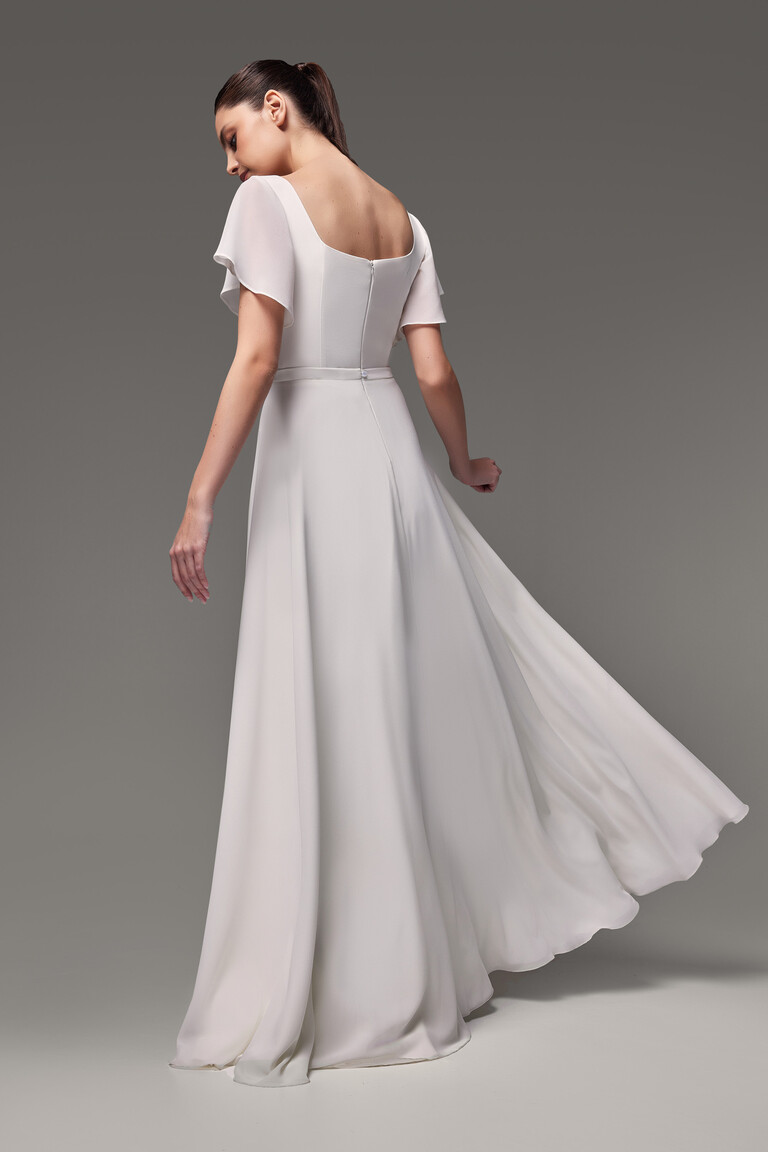 Edda ivory bridal gown back view featuring square neckline and sheer sleeves