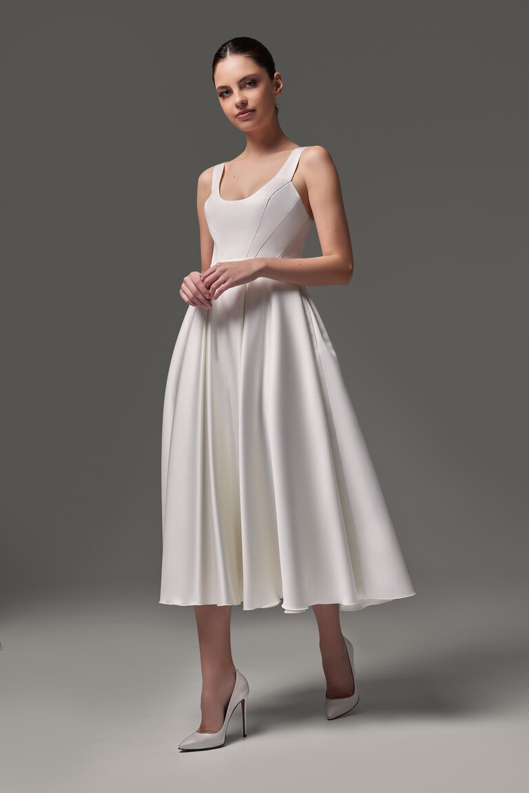 Model in the Barbara midi ivory satin wedding dress, full length front view, displaying the clean lines of the A-line silhouette.