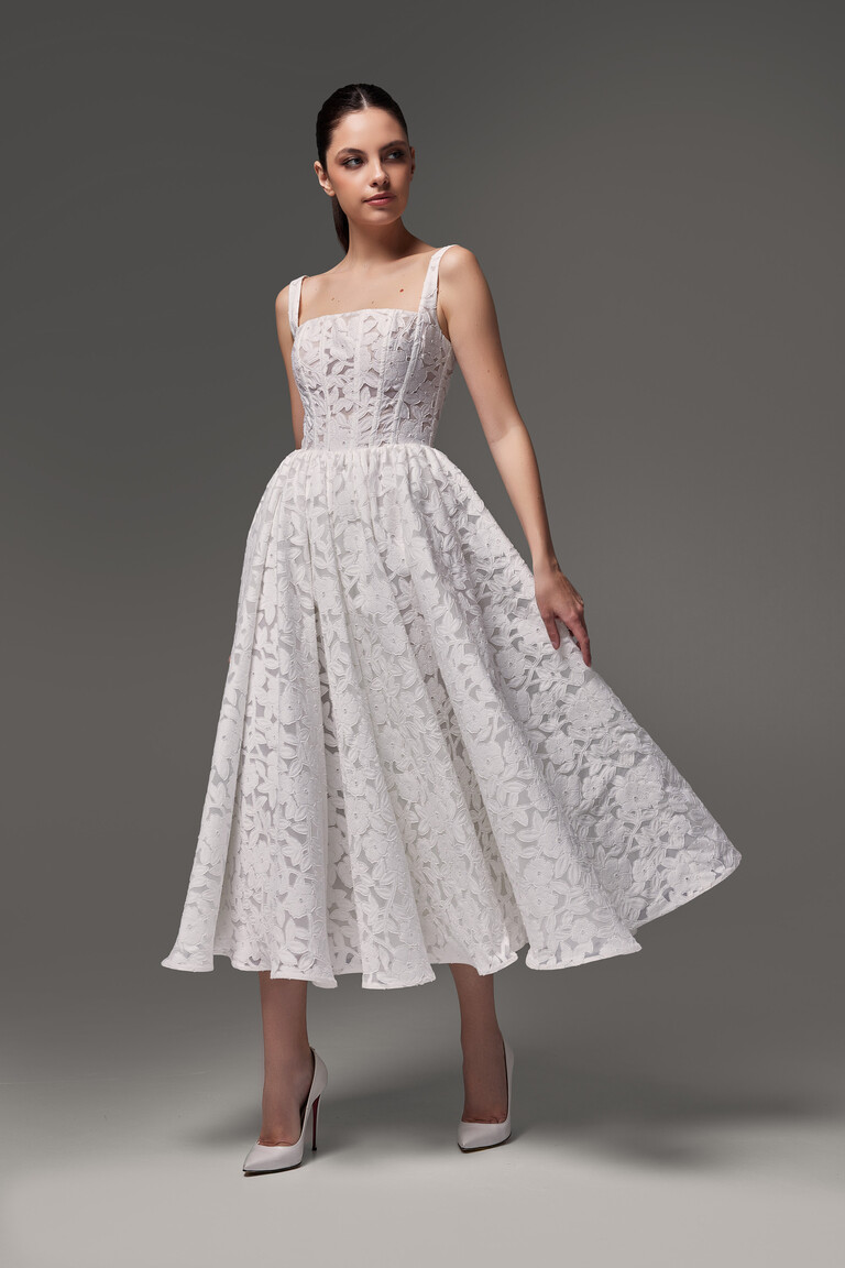 Classic A-Line Silhouette with Floral Lace Pattern Ruta Midi tea-length wedding dress in floral lace with A-line skirt and pleated waist