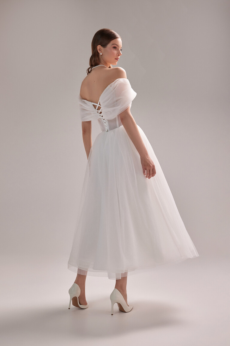 Unona Tutu Midi tea-length wedding dress back. Features an adjustable criss-cross lacing on the corset and A-line skirt.