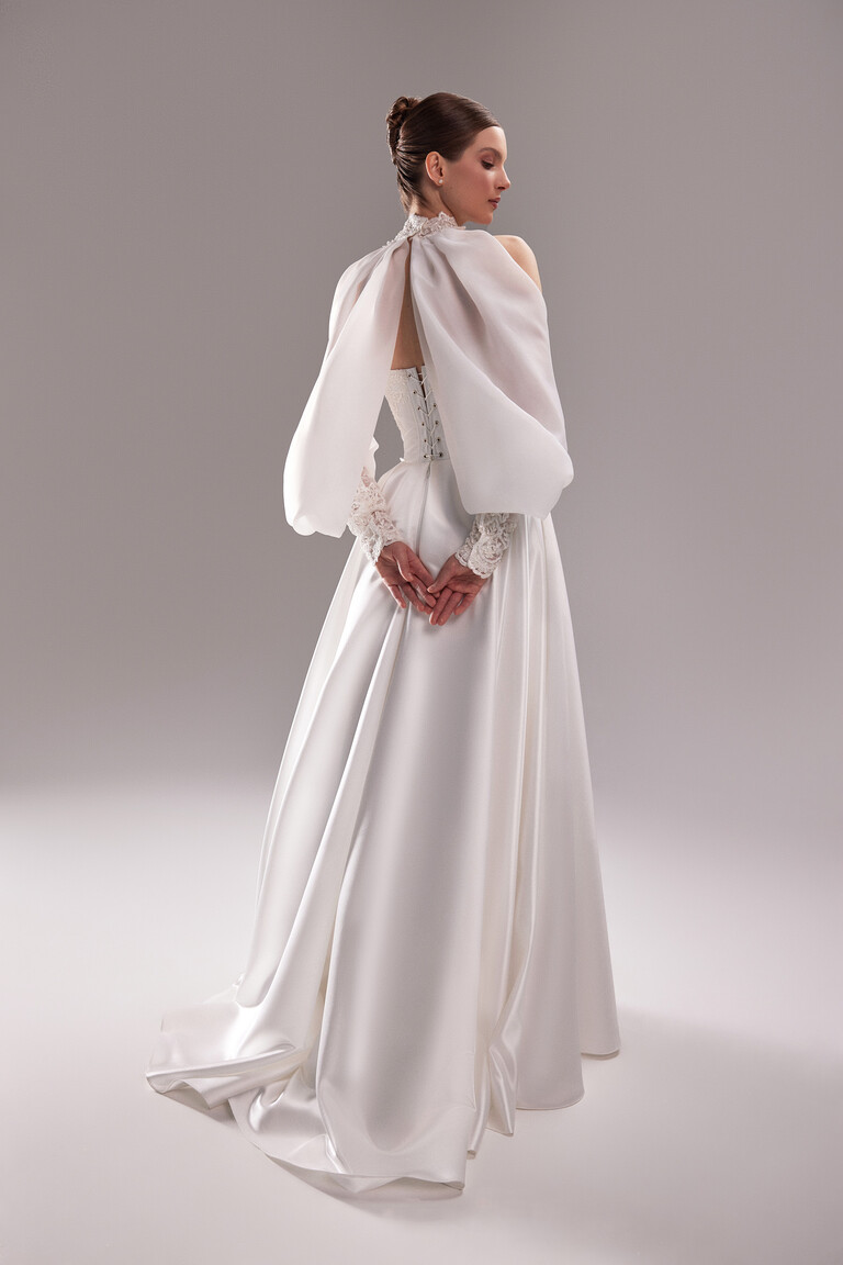 Corset Back Lacing Detail Demna satin wedding dress back view showing corset lacing and detachable lace sleeves