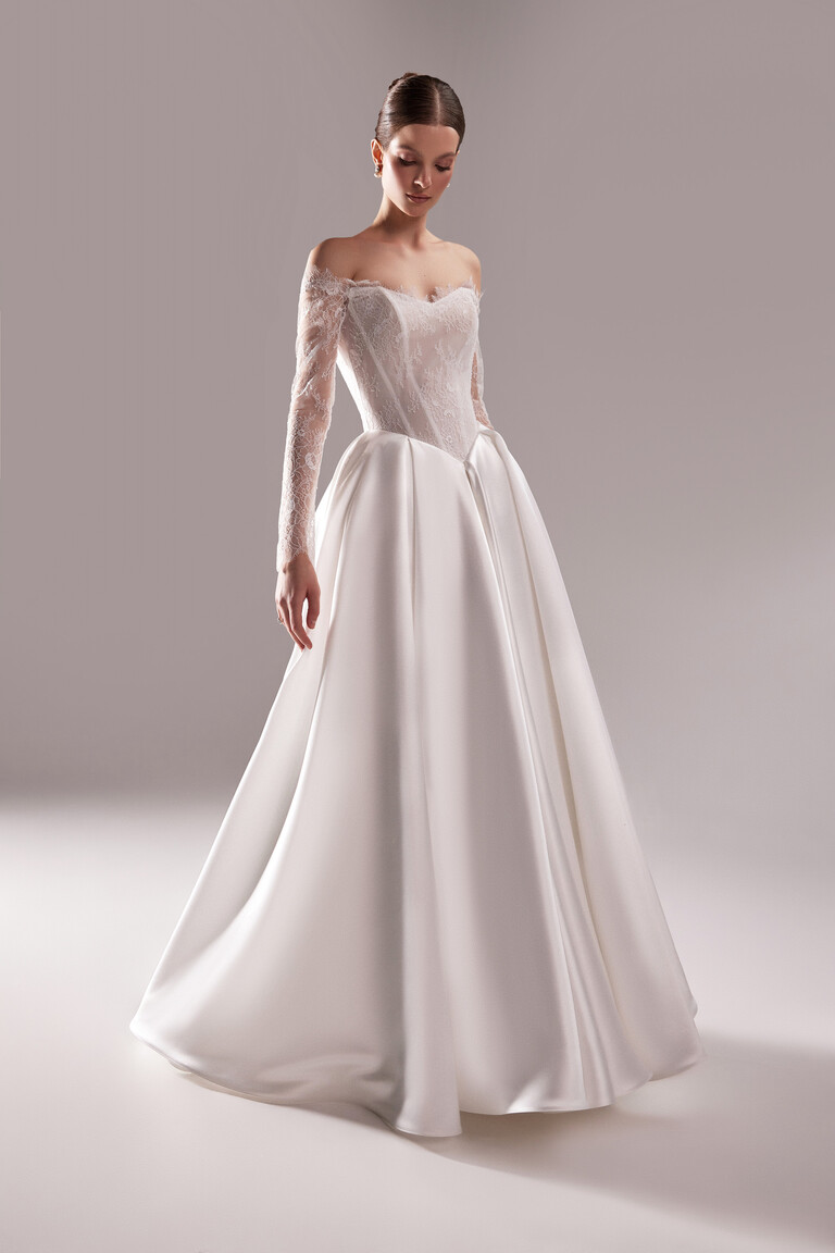 Adore ivory ball gown front angle showing basque waist lace corset and satin skirt