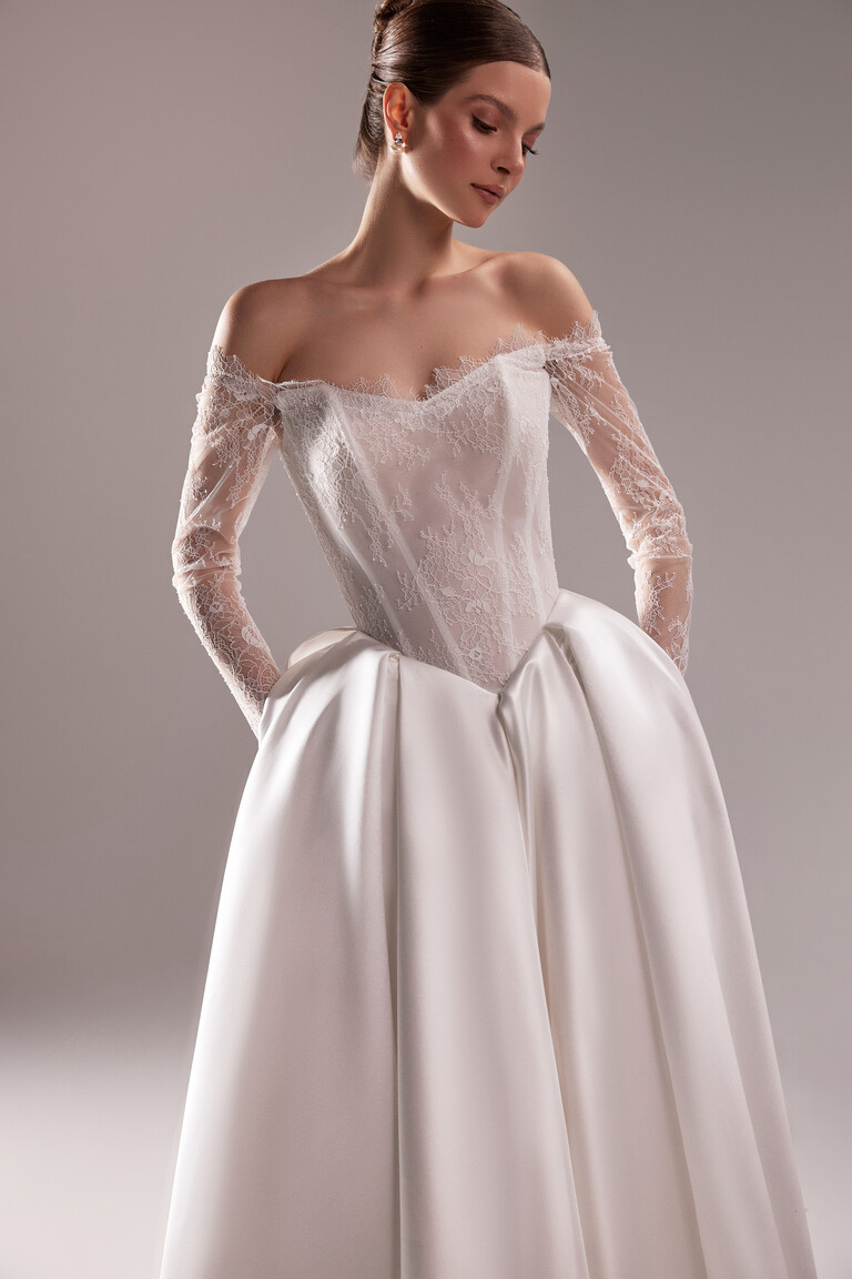 Adore satin ball gown front view with pockets and long lace sleeves
