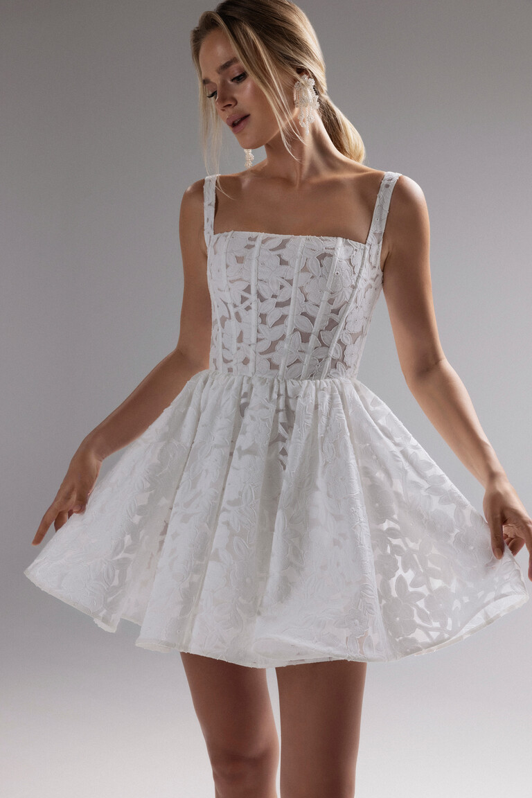 Ruta mini A-line wedding dress front showing floral lace pattern and structured corset bodice