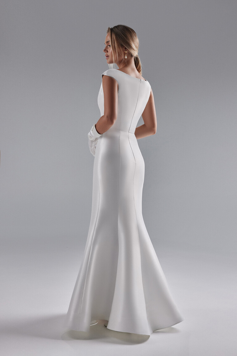 Back view of Harper mermaid wedding dress in off-white stretch crepe fabric