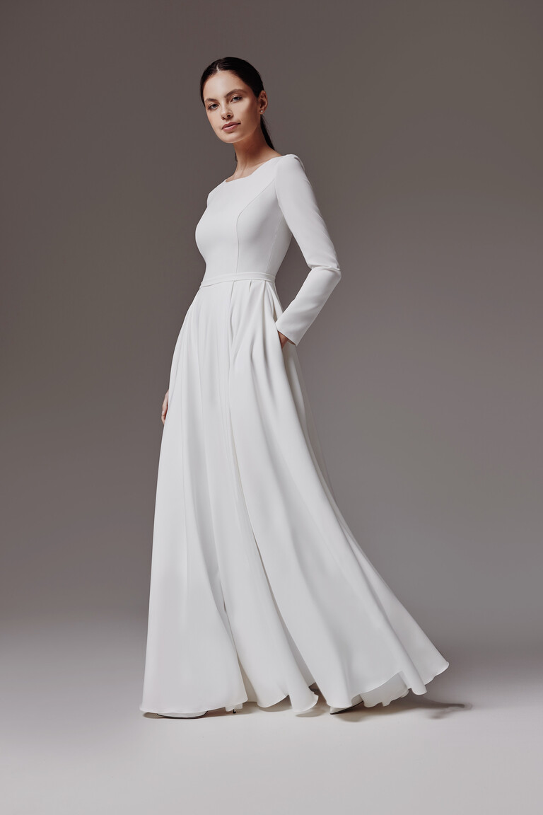 Adria wedding dress 3/4 view showing structured bodice with princess seams