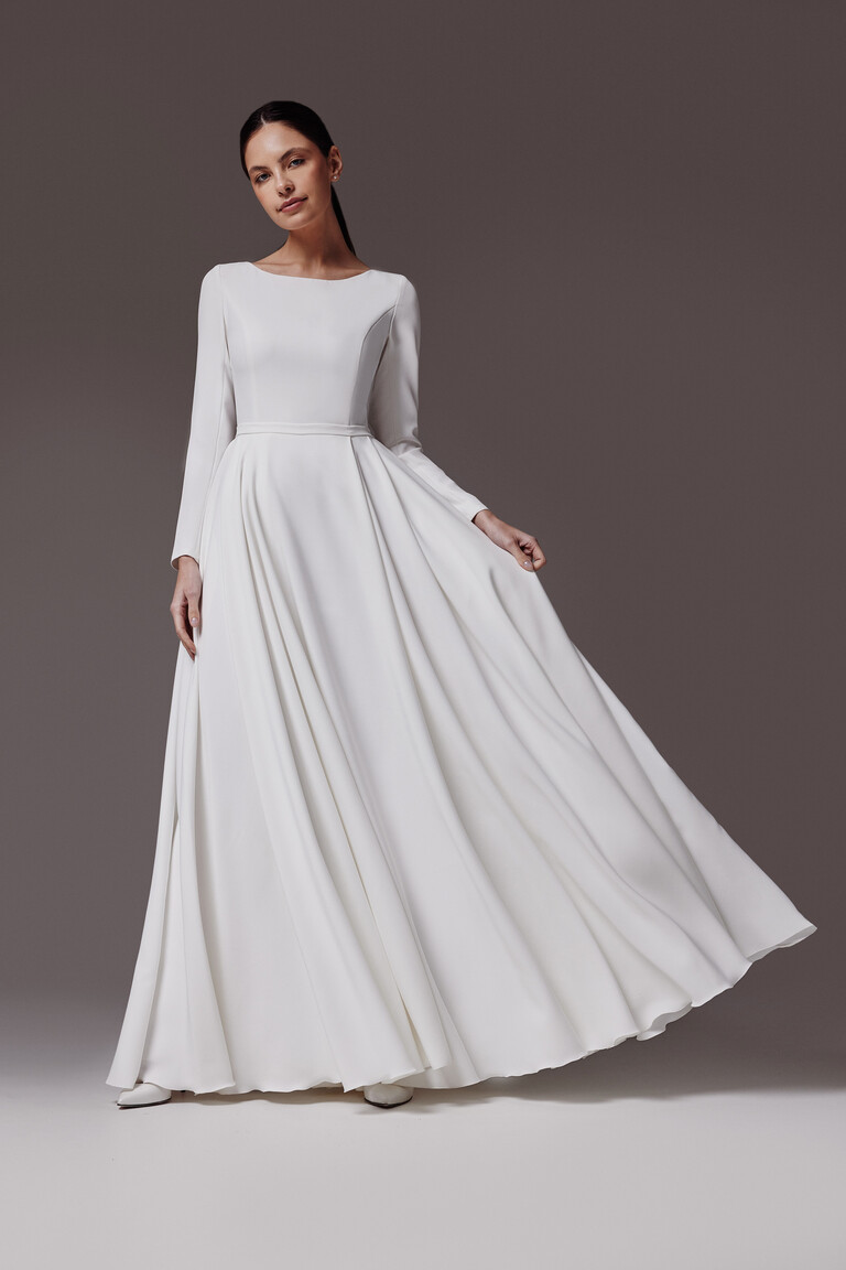 Full-length front view of Adria off-white crepe gown with boat neckline