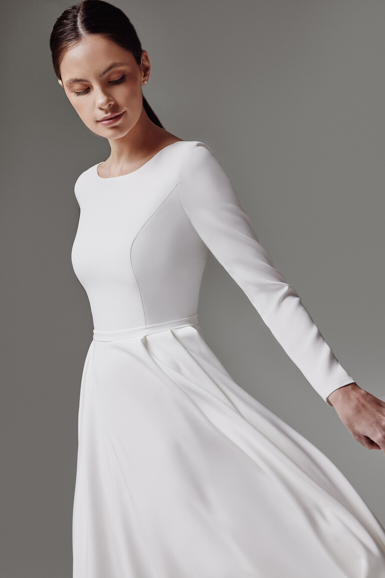 Adria dress 3/4 view highlighting curved princess seams and waistband