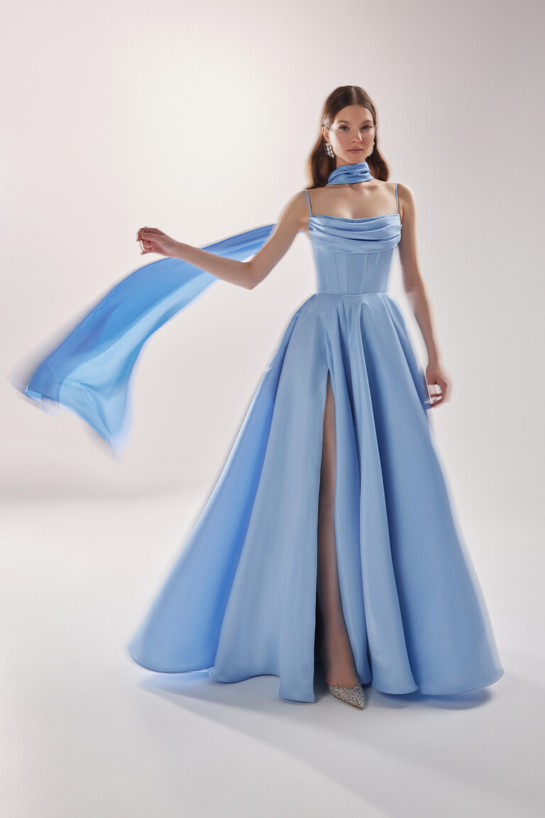 Rihanna strappy corset gown with matching fabric scarf accessory and thigh-high slit