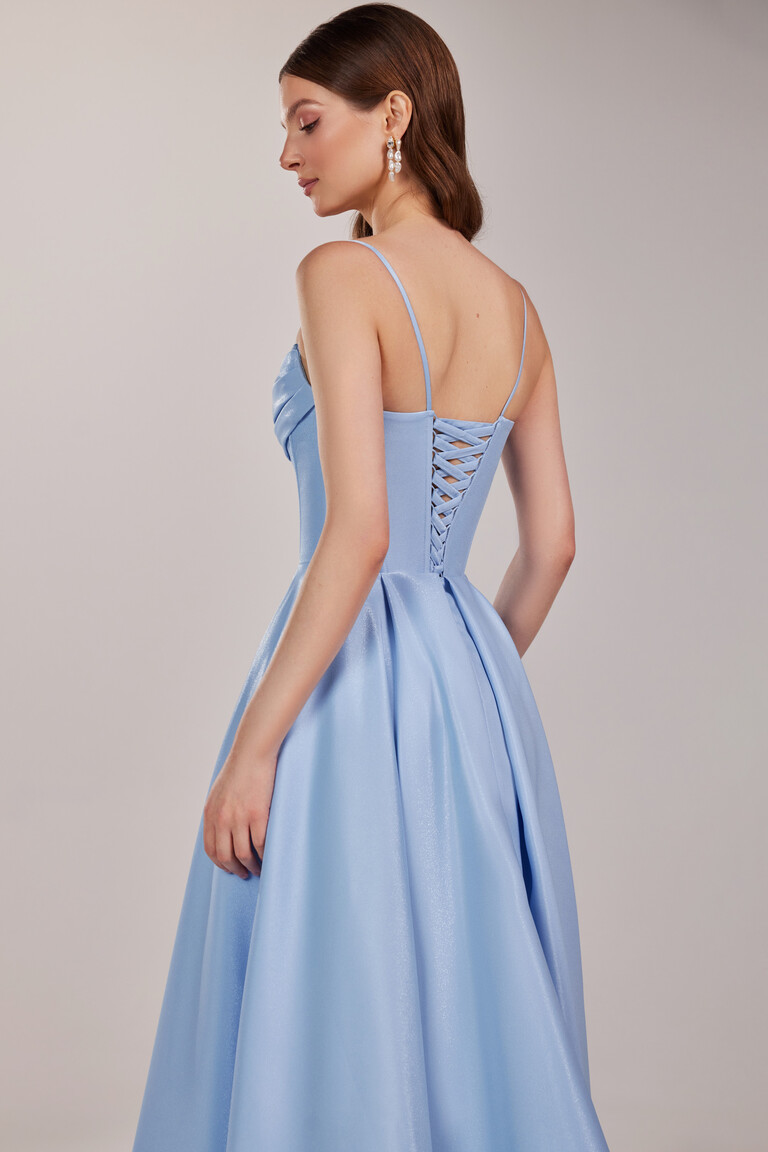 Detailed back view of Rihanna prom dress featuring satin pleats and corset lacing