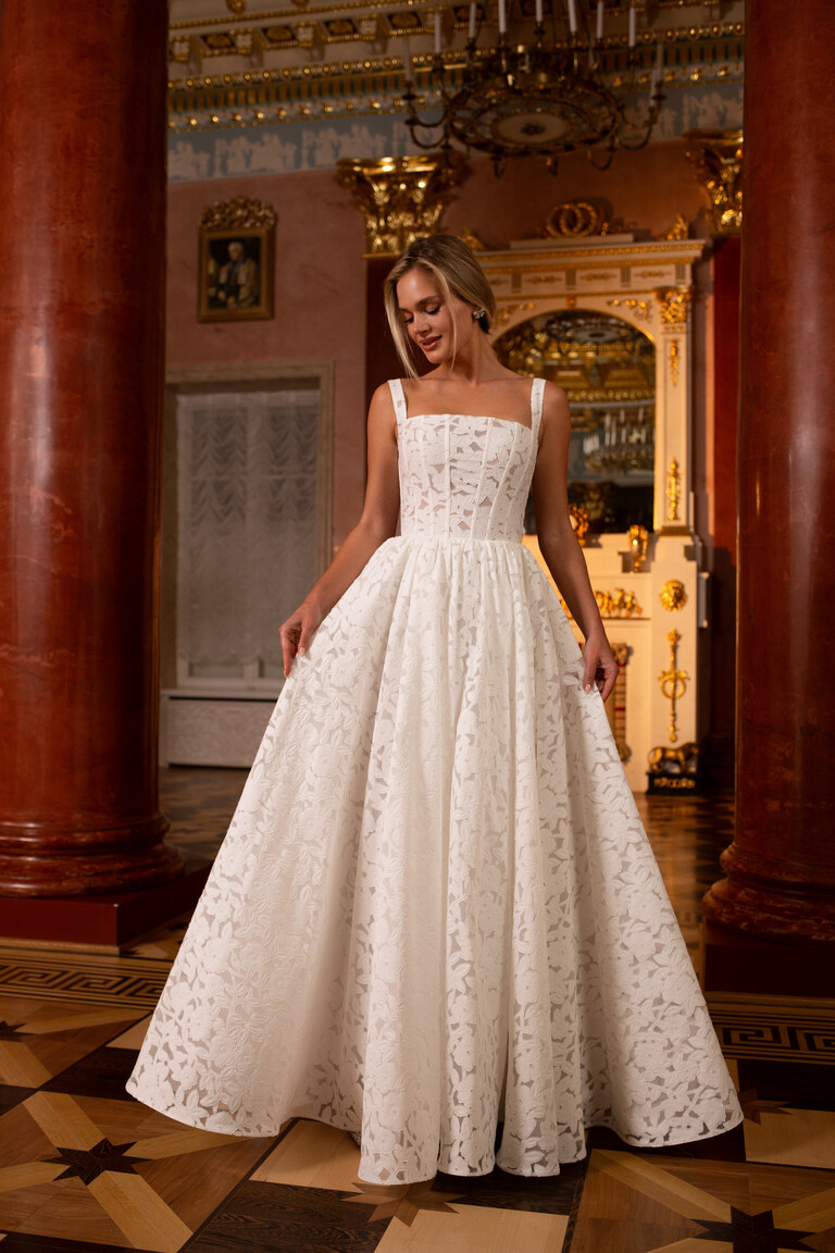 Ruta square neck A-line wedding dress in ornate interior setting front view