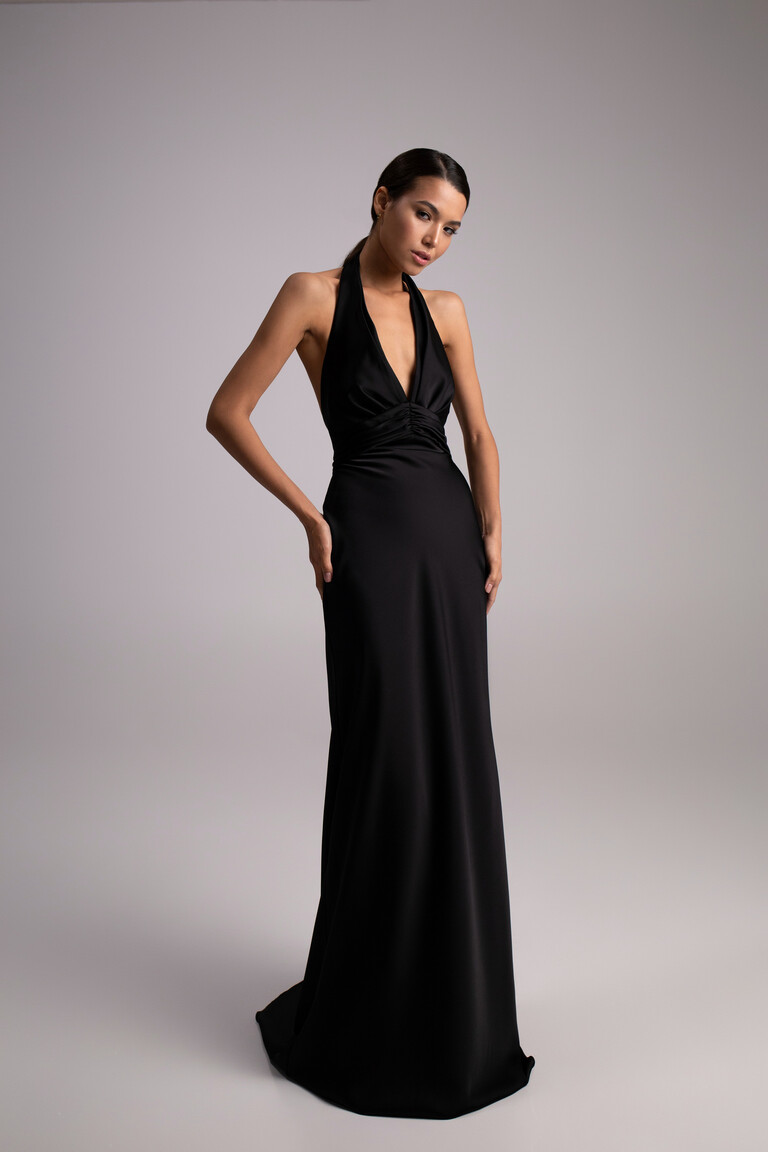 Full length Athena black satin slip dress with halter neckline and minimalist column silhouette