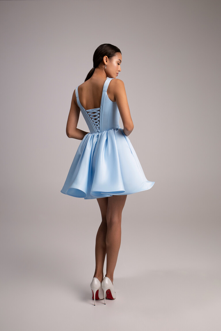 Full length back view of Casia Mini light blue satin dress showing lace-up corset closure and flared mini skirt