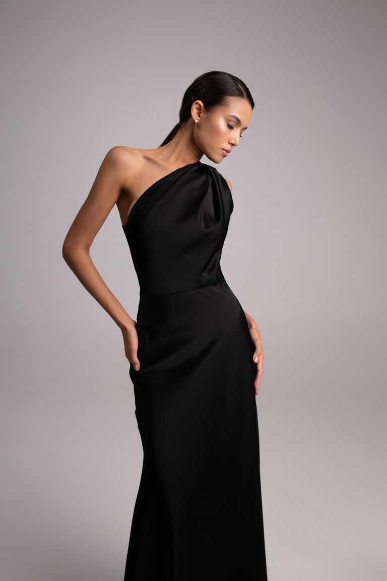 Unona Julia dress black satin fabric detail with fitted bodice and asymmetrical one shoulder drape
