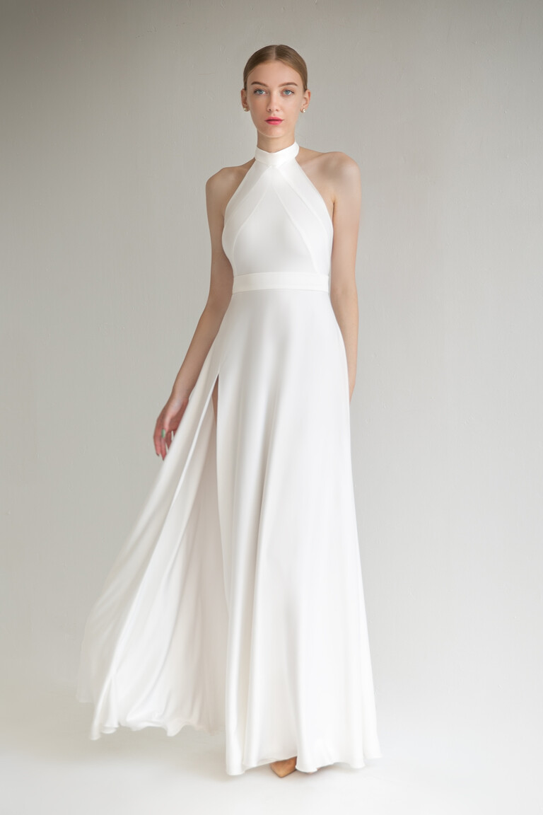 Unona Mary ivory wedding dress front view highlighting the halter neck panel detailing and high leg slit