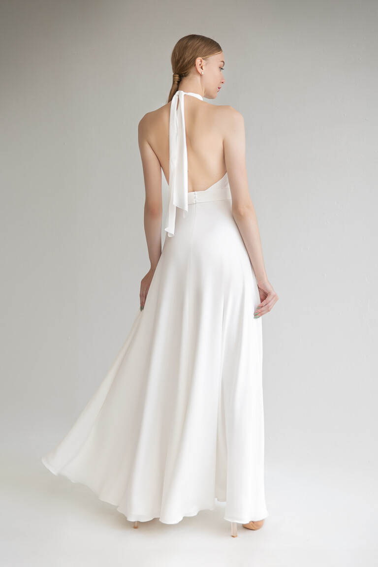 Full back view of the Unona Mary ivory silk backless gown with neck ties and button details on the waist
