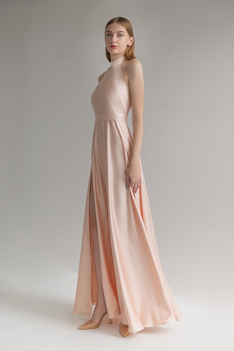 Unona Mary peach floor-length evening gown in a three-quarter pose highlighting its elegant A-line silhouette.