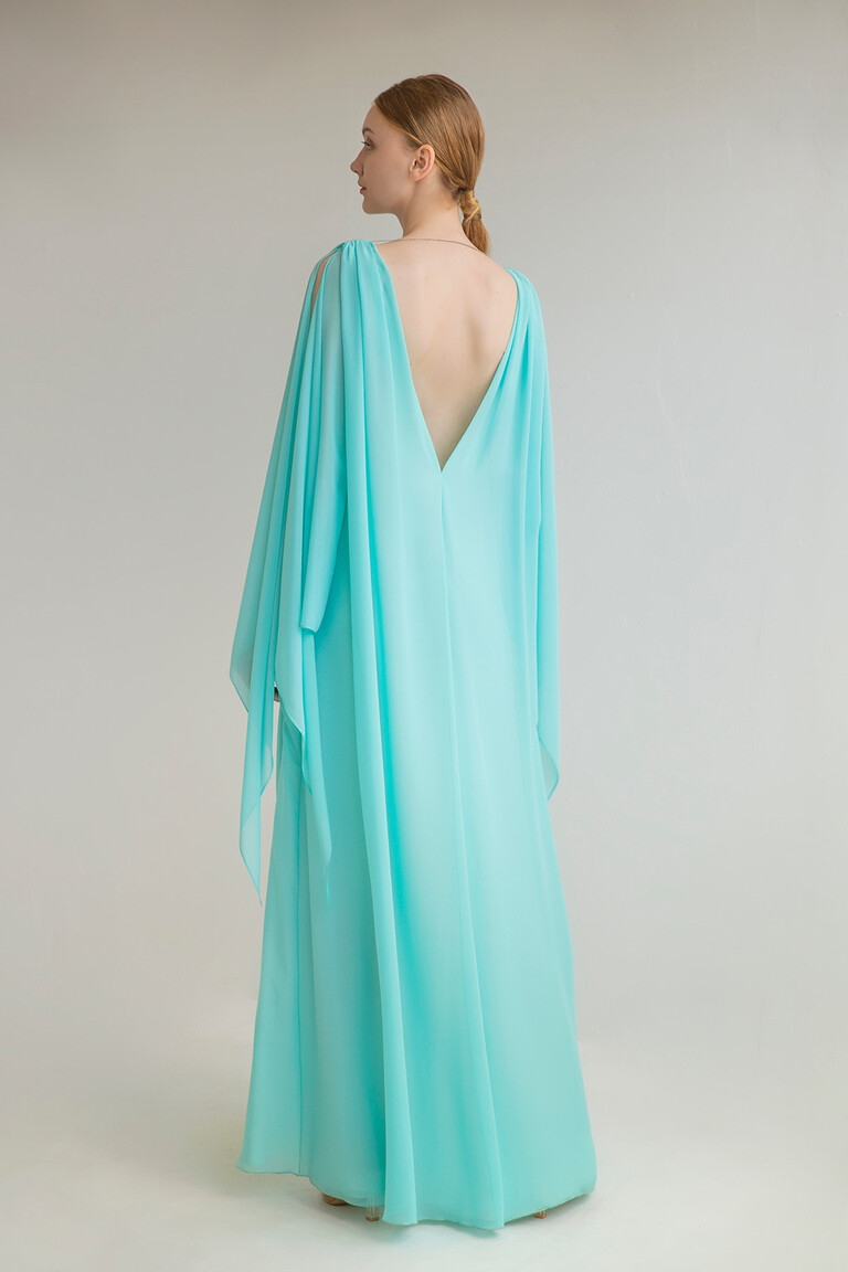 Stunning Open Back Detail of the Joan Gown Full back view of the Joan dress in Tiffany Blue highlighting the deep V-cut open back and floor-length chiffon skirt